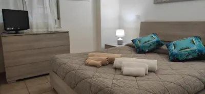 Letto o letti in una camera di Casa di Eloisa