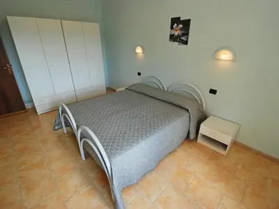 Letto o letti in una camera di Apartment Is Murtas-4 by Interhome