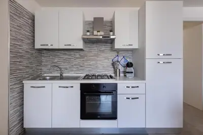 Cucina o angolo cottura di GuestHost - Al civico 5 - Mondern Apartments & Suite!