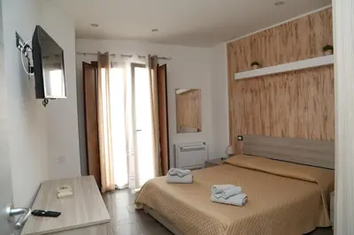 Letto o letti in una camera di GuestHost - Al civico 5 - Mondern Apartments & Suite!