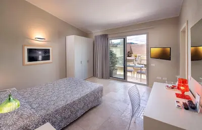 TV o dispositivi per l'intrattenimento presso Domu Noa Hotel