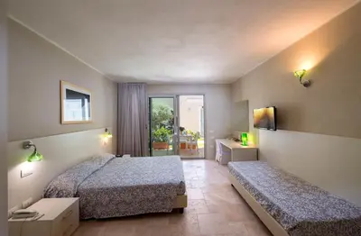 Letto o letti in una camera di Domu Noa Hotel