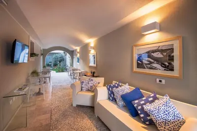 TV o dispositivi per l'intrattenimento presso Domu Noa Hotel