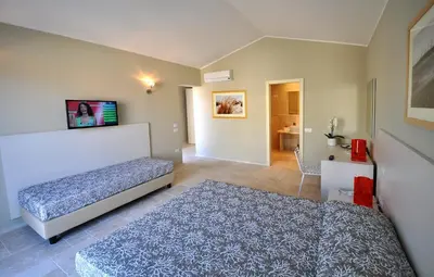 Letto o letti in una camera di Domu Noa Hotel