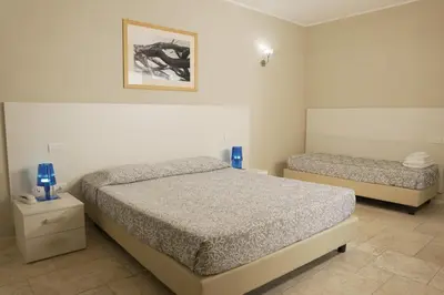 Letto o letti in una camera di Domu Noa Hotel