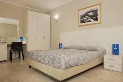 Letto o letti in una camera di Domu Noa Hotel