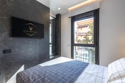 TV o dispositivi per l'intrattenimento presso Vittoria's Luxury Apartment Cagliari