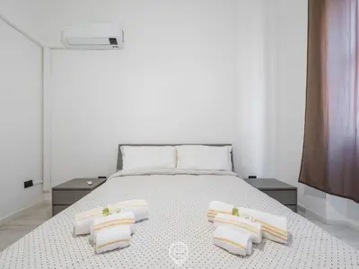 Letto o letti in una camera di Port View Apartment