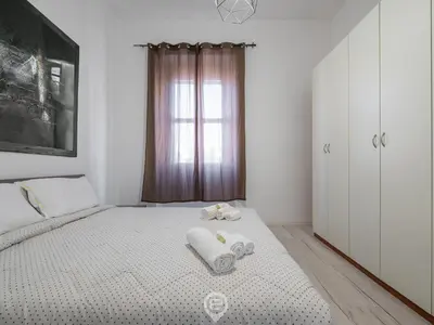 Letto o letti in una camera di Port View Apartment