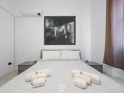 Letto o letti in una camera di Port View Apartment