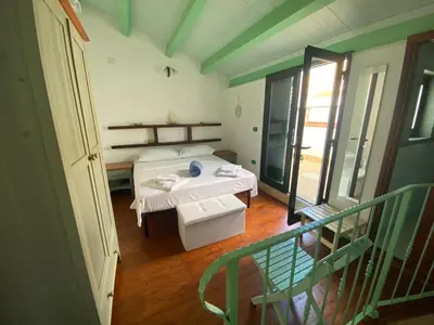 Letto o letti in una camera di Facussa house