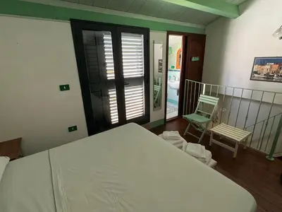Letto o letti in una camera di Facussa house