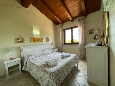 Letto o letti in una camera di L'Incanto Tanca Piras