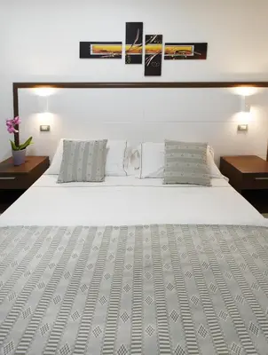 Letto o letti in una camera di Xenia Hotel