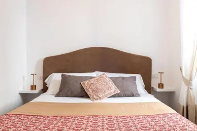 Letto o letti in una camera di Efamoresca