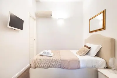 Letto o letti in una camera di Efamoresca