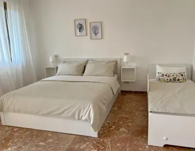 Letto o letti in una camera di Mare & Monti Casa Vacanze