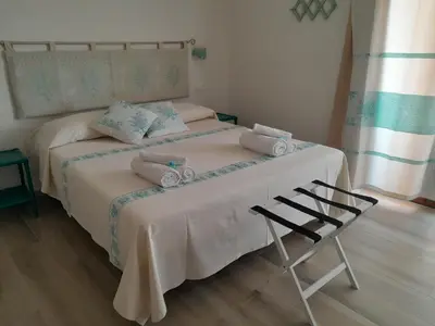 Letto o letti in una camera di CASA FANNI- rooms