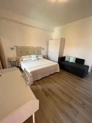 Letto o letti in una camera di CASA FANNI- rooms
