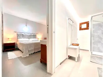 Letto o letti in una camera di Charming Bari Sardo
