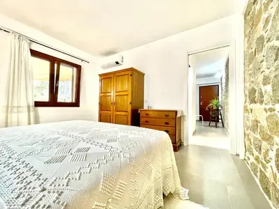 Letto o letti in una camera di Charming Bari Sardo