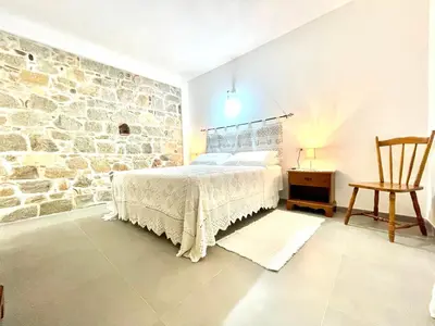 Letto o letti in una camera di Charming Bari Sardo