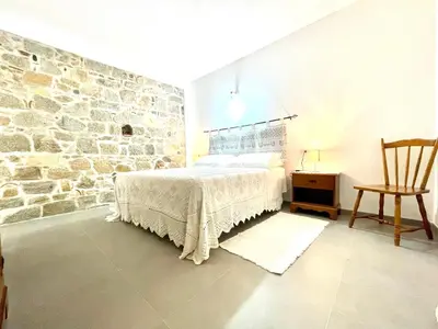 Letto o letti in una camera di Charming Bari Sardo