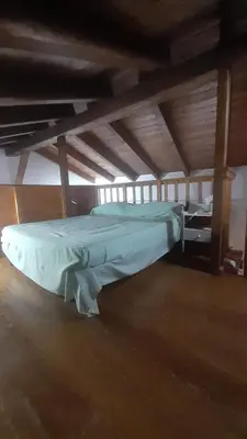 Letto o letti in una camera di Casa Arborea