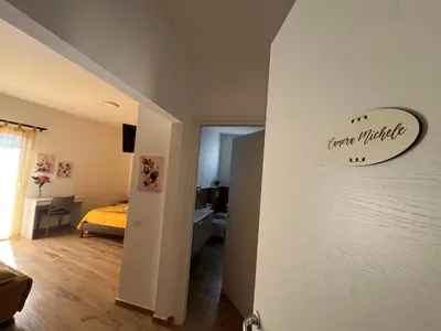 Letto o letti in una camera di B&b Niu Susu