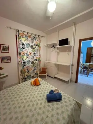 Letto o letti in una camera di CASA ADELE a Villasimius al centro del paese !