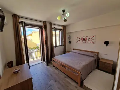 Letto o letti in una camera di CASA MADE'