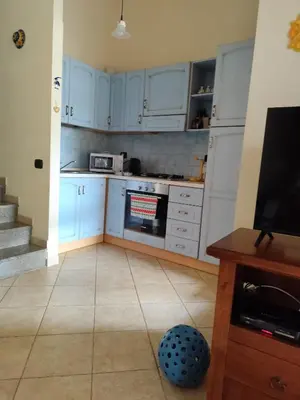 Cucina o angolo cottura di Vittorio House Villetta indipendente con giardino a Villasimius
