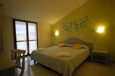 Letto o letti in una camera di Hotel Jasmine