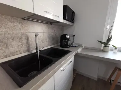 Cucina o angolo cottura di Maison - Elegante Casa a pochi minuti dal mare