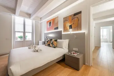 Letto o letti in una camera di Casa Spada Apartments
