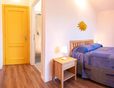 Letto o letti in una camera di Ollu e Stentu