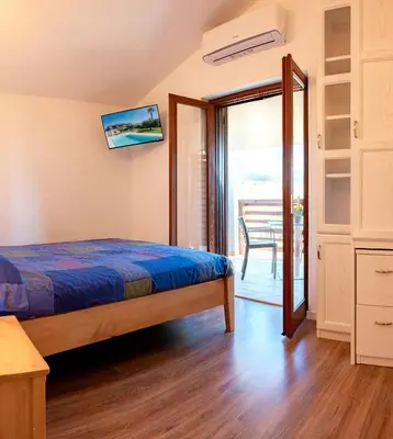 Letto o letti in una camera di Ollu e Stentu