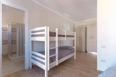 Letto o letti in una camera di CalaBisso