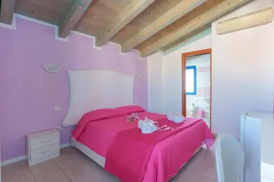 Letto o letti in una camera di CalaBisso
