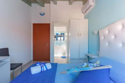 Letto o letti in una camera di CalaBisso