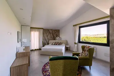 Letto o letti in una camera di Nuovi Poderi Rooms