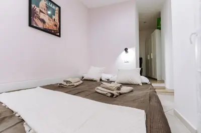 Letto o letti in una camera di Casa 