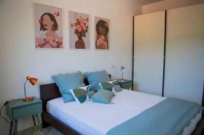 Letto o letti in una camera di Blue Vista