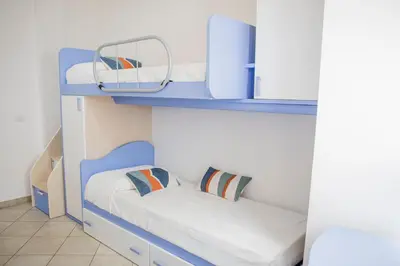 Letto o letti in una camera di Blue Vista