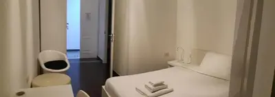 Letto o letti in una camera di Cagliari d'Amare Via Roma