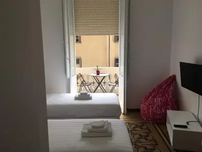 Letto o letti in una camera di Cagliari d'Amare Via Roma