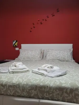 Letto o letti in una camera di ButterflyHouse