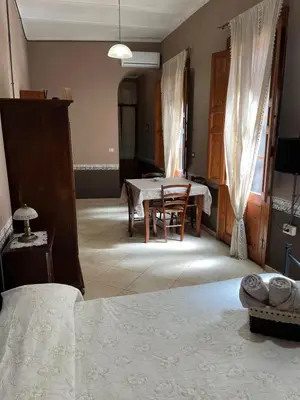 Letto o letti in una camera di B&B Su Maimoni