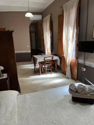 Letto o letti in una camera di B&B Su Maimoni