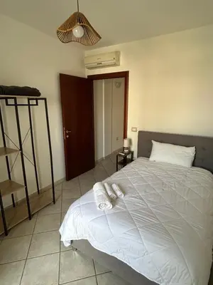 Letto o letti in una camera di Santu Marcu apartment